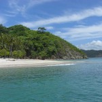 The crystal clear waters of Tortuga Island's best beach