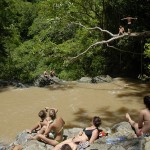 Diving in the upper pool of Montezuma Falls. Note the high water level and brown water, due to rain the day before.