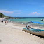 A tour/excursion boat in Montezuma. The boats for tourism have shade.
