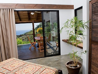 Casa Frangipani - bedroom to the balcony
